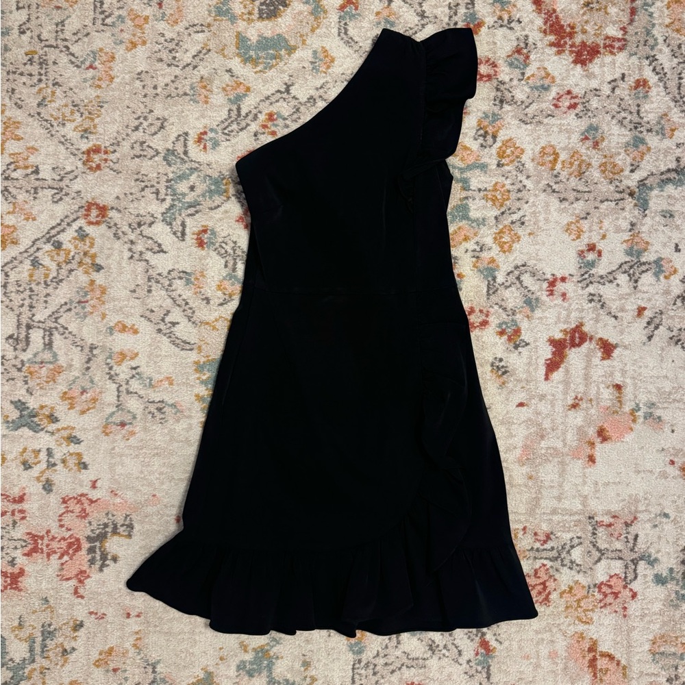 One shoulder little black dress with ruffles. Worn once in perfect condition.